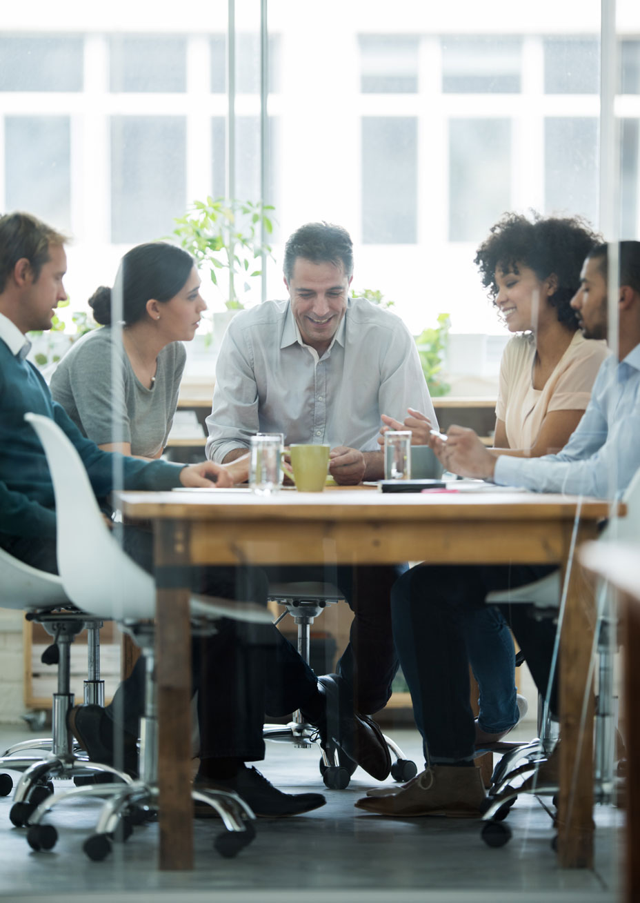 Five images sitting in a conference room.